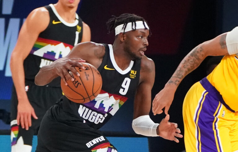 篮球CBA比赛尾声出现争议判罚引热议（CBA篮球赛末段争议判罚引发热议）